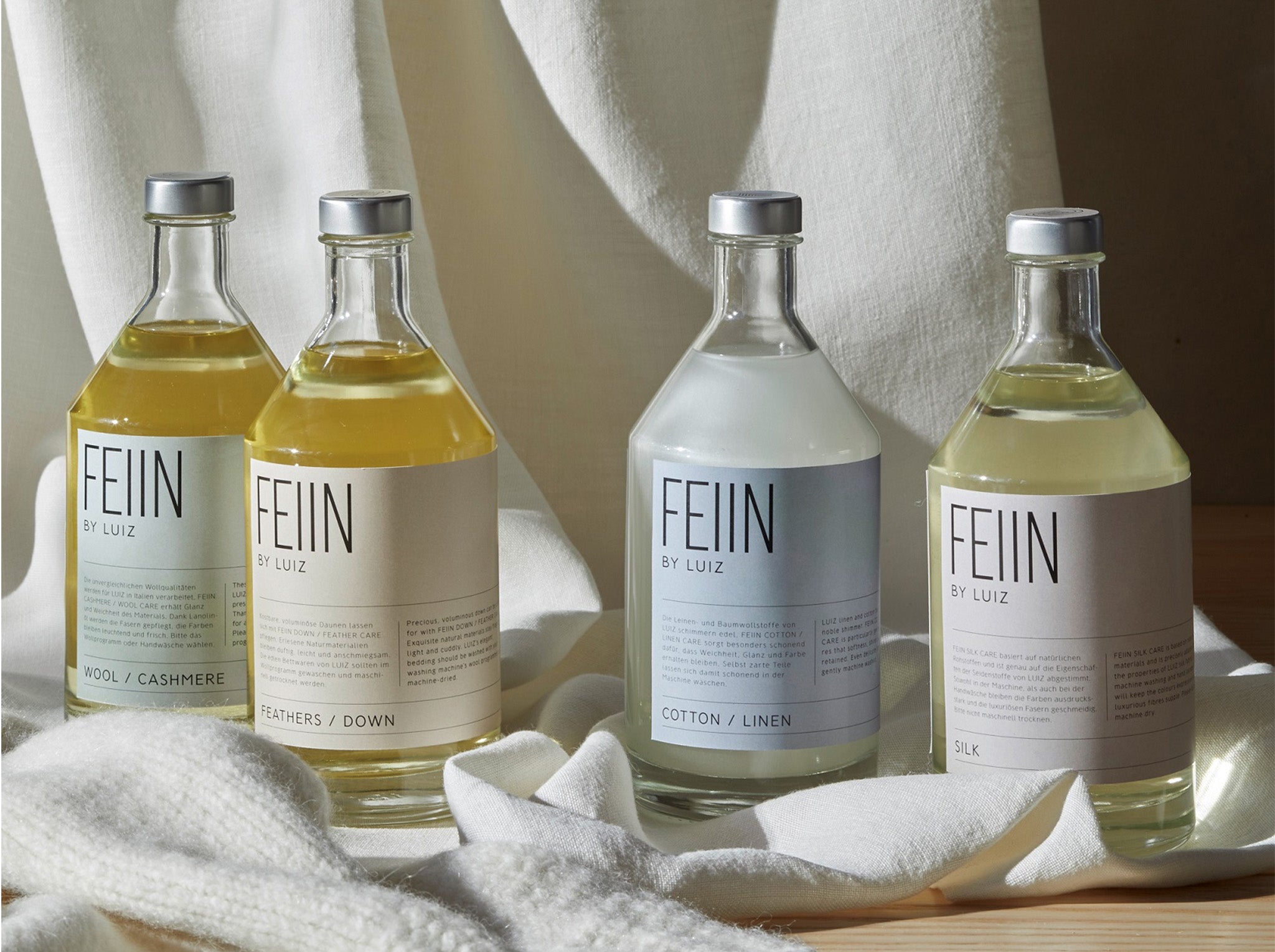 FEIIN by Luiz Downs / Feathers